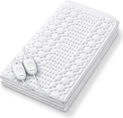 A white electric heated mattress topper is folded and displayed on a white background.