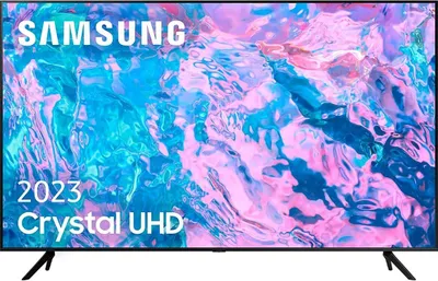 A Samsung Crystal UHD TV is shown with marketing text overlaid on the screen.