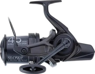 A black fishing reel is shown against a white background.