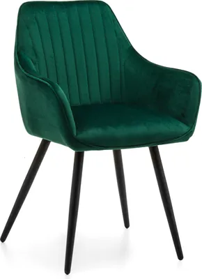 A green velvet armchair with black legs, shown against a white background.