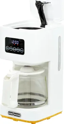 A white filter coffee machine with a glass carafe and a digital display.