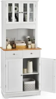 A white freestanding kitchen storage cabinet with a wooden top and glass doors on the upper section.