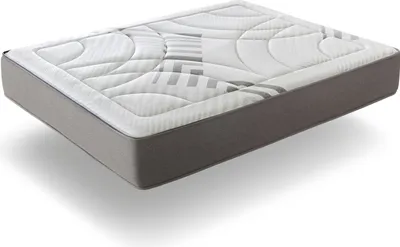 A mattress is shown from a slightly elevated side angle on a white background.