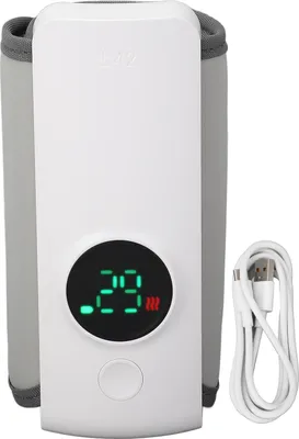 A white portable bottle warmer with a gray cuff is shown against a white background. A white USB cable is next to it.