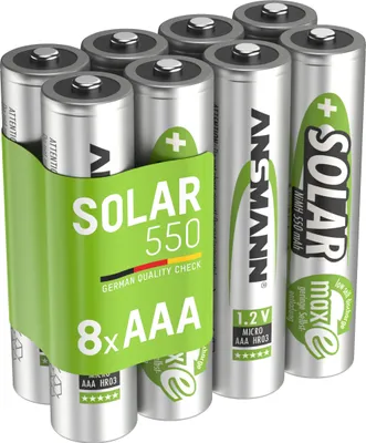 A pack of eight AAA batteries in a green plastic holder.
