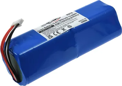 A blue battery pack with a label and wires.