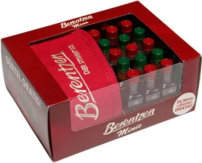 A product box containing small bottles of alcohol and a red accessory.