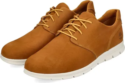 A pair of Timberland shoes on a white background.