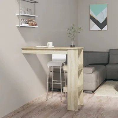 A bar table with a stool in a living room setting, next to a sofa.