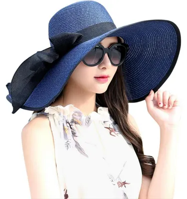 Productafbeelding van Zomerhoed dames, strooien, met rand en strik, one size, marineblauw