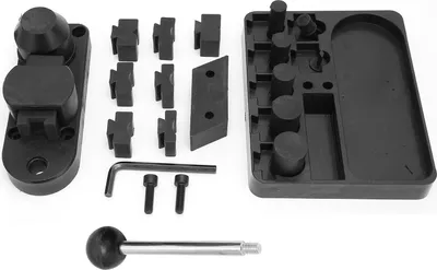A set of jewelry making tools laid out on a white background.