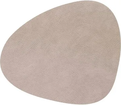 A single, irregularly shaped placemat is shown against a white background.