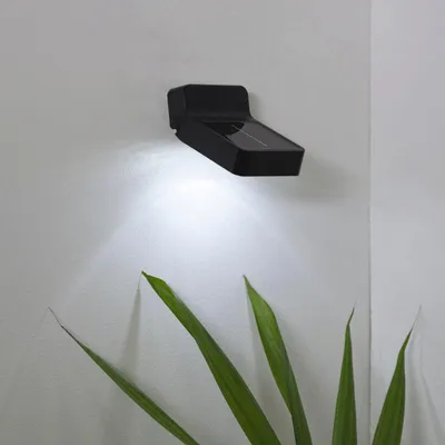 Produktbild von LED Solar Wandleuchte 'Wally' - 4 weiße LED - 6h Licht mit 6lm - Dämmerungssensor - schwarz