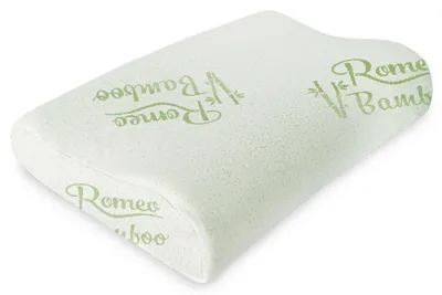A white orthopedic pillow with green text and bamboo leaf graphics.