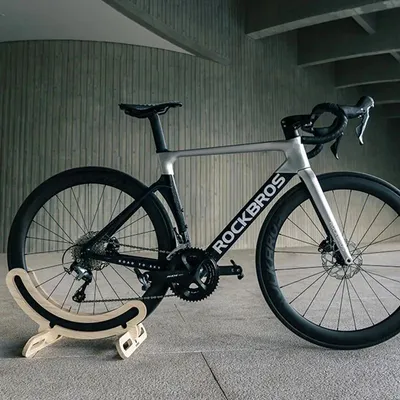 Produktbild von Fahrradständer - Bodenständer aus Holz - Für 1 Fahrrad - Rechteckig - Stabiler Standfuß - Für den Haushalt - Einfache Montage