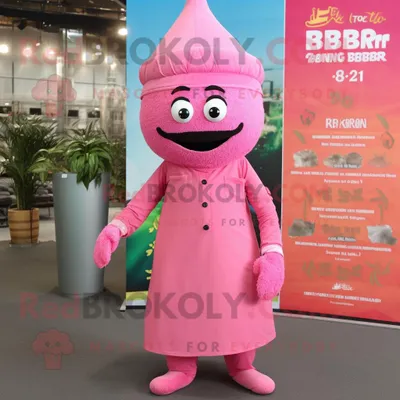 Immagine prodotto di Personaggio del costume della mascotte REDBROKOLY Biryani rosa vestito con una tuta e cappelli