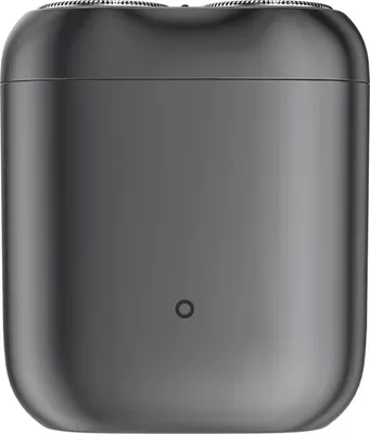 A close-up, studio shot of a dark gray electric shaver.
