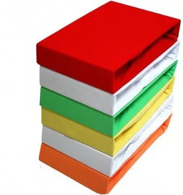 A stack of colorful fitted sheets.