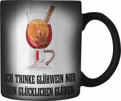 Produktbild von Trendation - Glühwein Farbwechsel Zauber-Tasse Lustig Spruch Glühweinbecher mit Henkel Doppelwandig GlühweinFarbwechsel Zauber-Tassen Gläser Weihnachtsmarkt Becher Farbwechsel Zauber-Tassen Geschenk - Von Glücklichen Glühen (Schwarz)