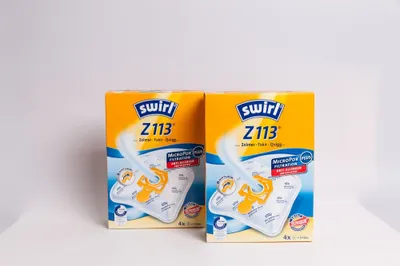 Two boxes of Swirl vacuum cleaner bags are displayed against a white background.