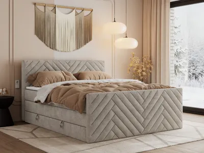 A bedroom scene with a bed, wall decor, and a window view of a winter landscape.