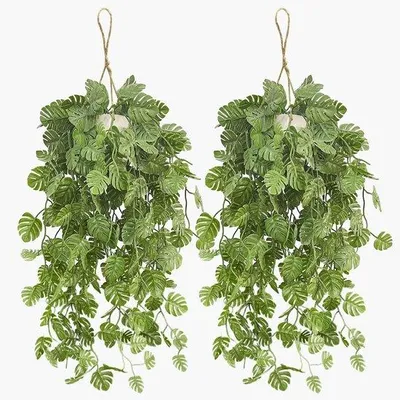 Produktbild von Unyqoos Set mit 2 künstlichen Hängepflanzen und realistischen Monstera-Blättern, pflegeleicht und wetterfest
