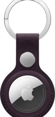 A product shot of an Apple AirTag with a leather loop accessory.