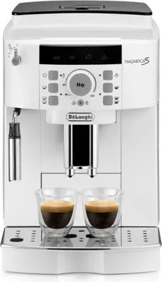 A white De Longhi Magnifica S coffee machine with two espresso cups in the foreground.