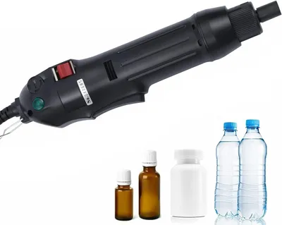 A handheld electric sealing machine is shown above several bottles, including two water bottles, a white pill bottle, and two small amber glass bottles.