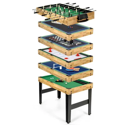 A multi-game table with different game surfaces stacked on top of each other.