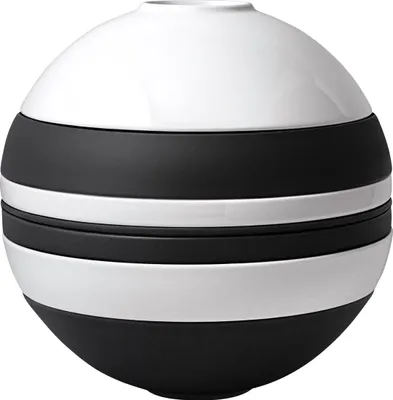 A spherical vase with black and white stripes.