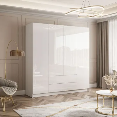 A modern bedroom with a large white high-gloss wardrobe, a stylish armchair, a floor lamp, and a coffee table with a rug.