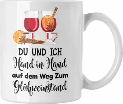 Produktbild von Trendation - Glühwein Tasse Lustig Spruch Glühweinbecher mit Henkel Doppelwandig Glühweintassen Gläser Weihnachtsmarkt Becher Tassen Geschenk - Hand In Hand Zum Glühweinstand (Weiß)
