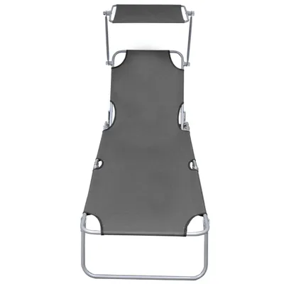 A top-down view of a gray folding lounge chair with a sunshade.