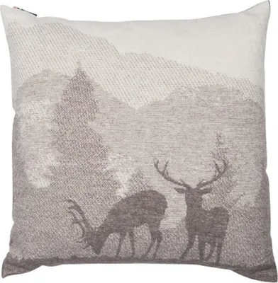 A cushion cover with a landscape design featuring deer and mountains.