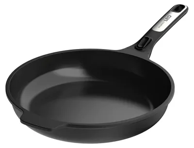 A black frying pan with a silver handle is shown against a white background.