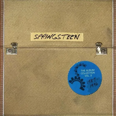 The image shows the cover of a limited edition album collection, designed to resemble a vintage amplifier or case.