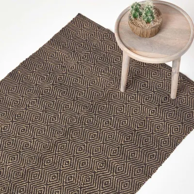 Produktbild von HOMESCAPES Handgewebter schwarzer Jute-Teppich mit geometrischem Muster, 120 x 180 cm