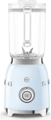 A pastel blue Smeg blender with a transparent jug is shown against a white background.