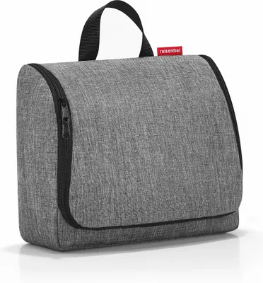 A gray toiletry bag with a black zipper and handle, against a white background.