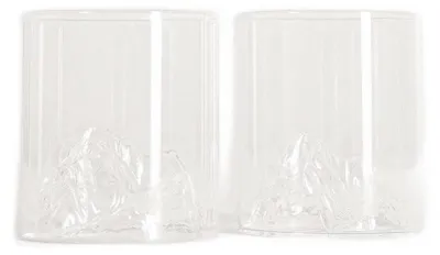 Two clear glasses with mountain-like structures at the bottom, placed side-by-side on a white background.