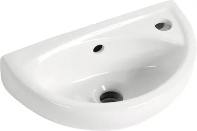 A white ceramic handwash basin with two holes on the top surface and a drain hole at the bottom.