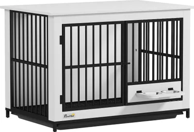 A white and black dog crate with two doors and two bowls attached to the front.