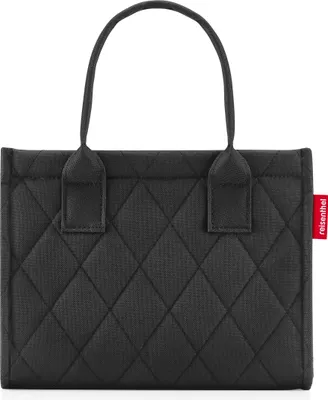 A black quilted tote bag with handles is shown against a white background.