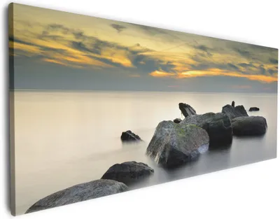Produktbild von Wallario Premium Leinwandbild Mystische Felsen im Meer in Größe 80 x 200 cm