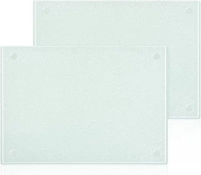 Zdjęcie produktu dla Deska do krojenia ze szkła hartowanego, 28x20 cm, 2 sztuki. Wyposażona w antybakteryjne właściwości i antypoślizgowe nóżki silikonowe, odporna na wysokie temperatury