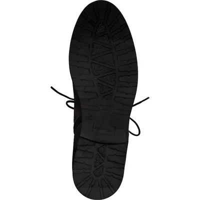 The sole of a black boot is shown against a white background.