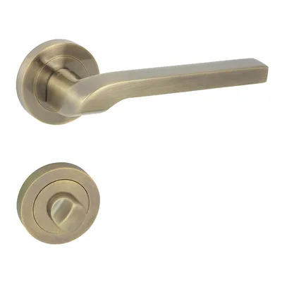 A door handle set with a round rosette, shown against a white background.