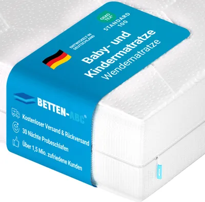A close-up view of a white mattress with a blue marketing band wrapped around it, highlighting product features and brand information.