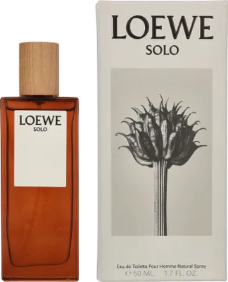 A product shot of a perfume bottle and its packaging.